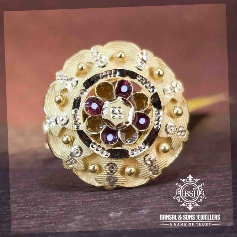 18. Gold coctail ring